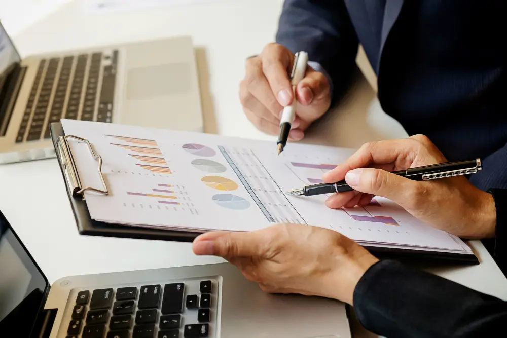 Professionals reviewing claim audit technology, billing procedures, and regulatory guidelines. Independent claim auditors like TFG Partners help self-funded plans comply.
